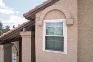 A Beige double hung window 